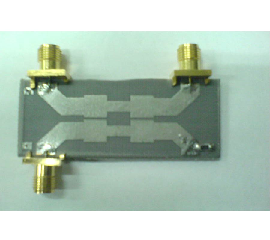 CROSSTALK REDUCTION USING STEP SHAPED TRANSMISSION LINE