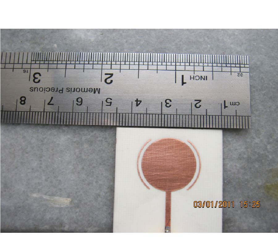 A COMPACT BAND-NOTCHED UWB PLANAR MONOPOLE ANTENNA WITH PARASITIC ELEMENTS