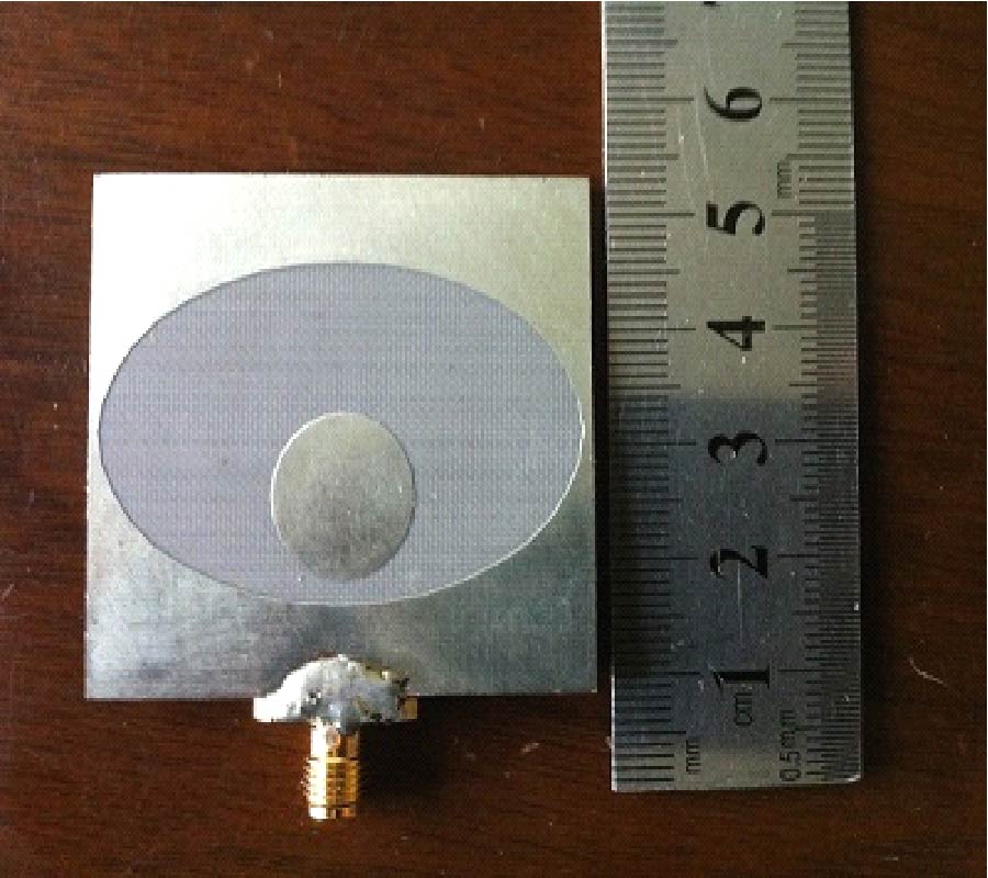 A CIRCULARLY POLARIZED ELLIPTICAL-RING SLOT ANTENNA USING AN L-SHAPED COUPLING STRIP