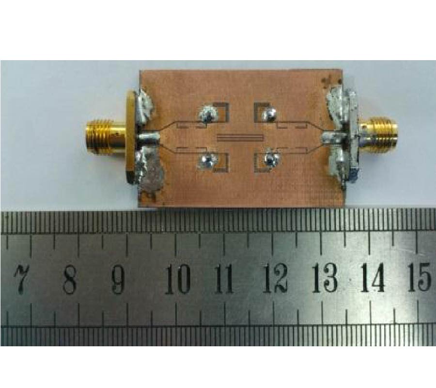 UWB BANDPASS FILTER WITH HYBRID STRUCTURE AND TWO TRANSMISSION ZEROS IN THE NOTCHED BAND