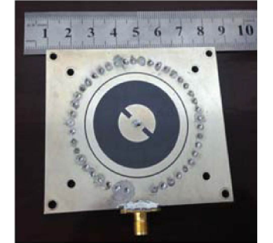 CIRCULARLY POLARIZED SUBSTRATE INTEGRATED WAVEGUIDE CAVITY-BACKED ANTENNA WITH ENHANCED BANDWIDTH FOR WIDEBAND WIRELESS APPLICATIONS