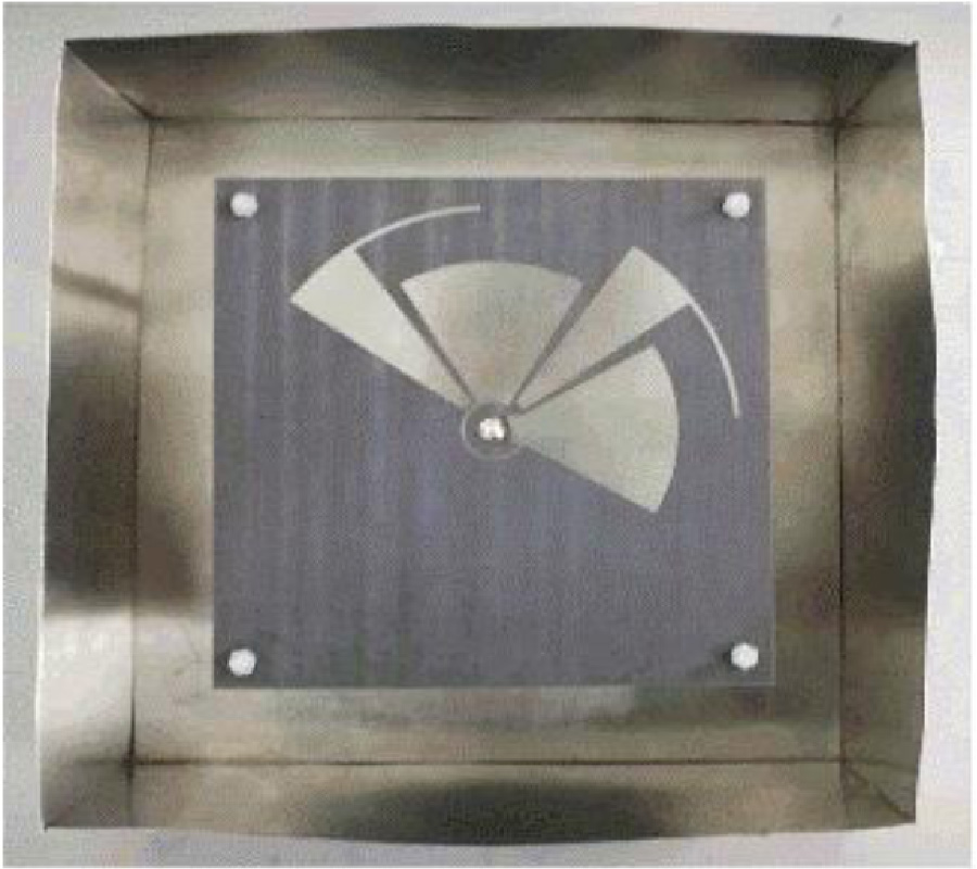 A CAVITY-BACKED WIDEBAND CIRCULARLY POLARIZED CROSSED BOWTIE DIPOLE ANTENNA WITH SEQUENTIALLY ROTATED PARASITIC ELEMENTS