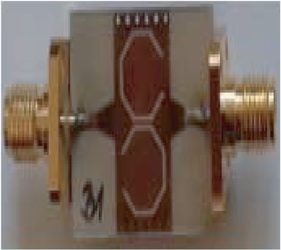 A NOVEL COMPACT SUBSTRATE INTEGRATED WAVEGUIDE FILTER USING MINIATURIZED STEPPED IMPEDANCE METAMATERIAL UNIT CELL