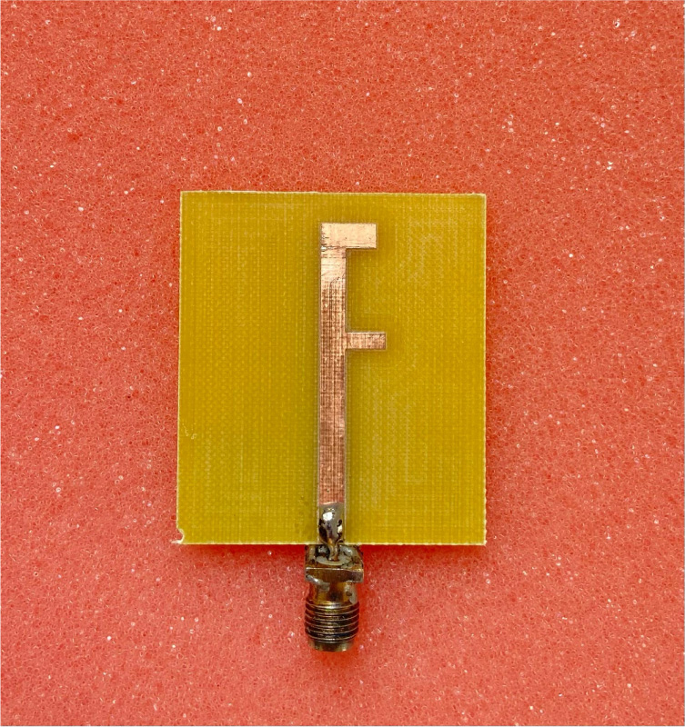 Design and Optimization of a Dual-band F-Shaped Monopole Antenna for 2.45/5.8 GHz ISM Medical Applications Using ANN and PSO