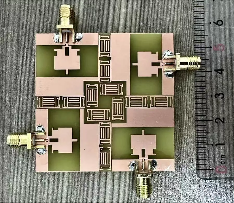 A Compact Four-port Axially Symmetric UWB-MIMO Antenna Array: Metamaterial-integrated Coplanar Waveguide for Broadband Operation with High Isolation