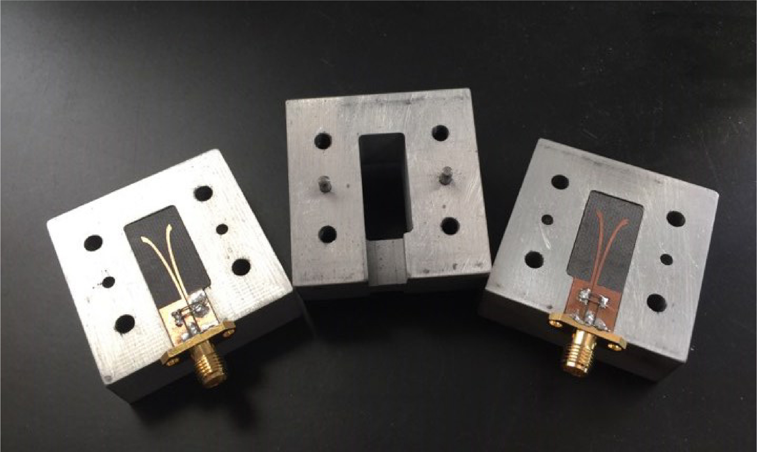 CPW- and MSL-to-RWG TE20 Mode Transitions