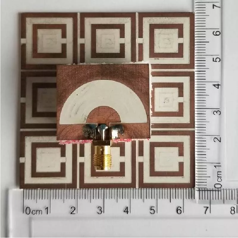 Flexible Circular Ring Slot Antenna with AMC Structure for Wearable Applications