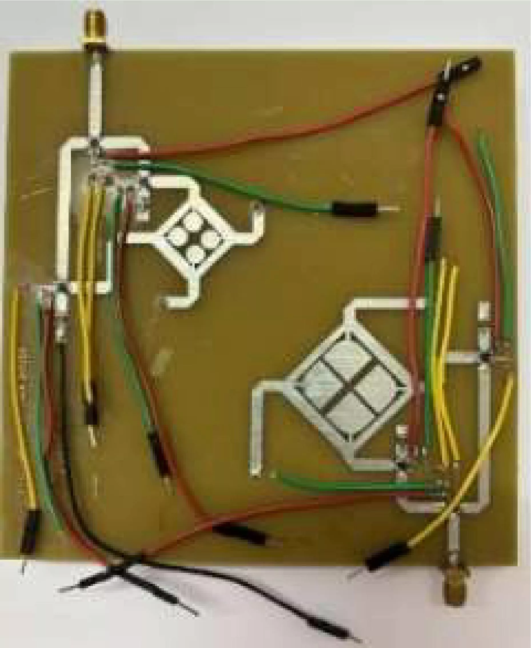 A Polarization Reconfigurable Dual-Band Dual-CP Shared Aperture Antenna Using RF MEMS Switch