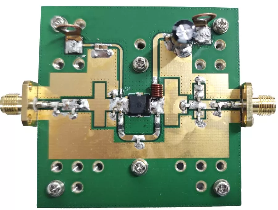 Design of an Ultra-Wideband LDMOS Power Amplifier Based on a Two-Stage Harmonic Suppression Network