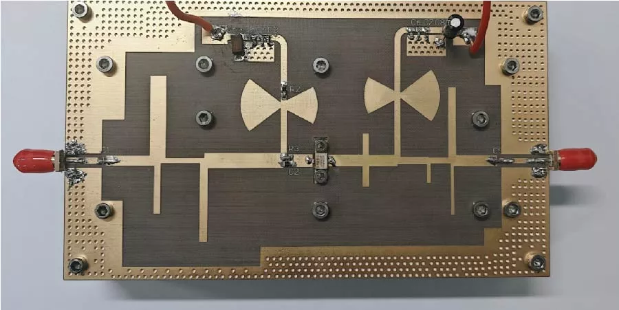 A Concurrent Dual-Band High-Efficiency Integrated Filtering Power Amplifier Coordinated with an Adjustable Transmission Zero