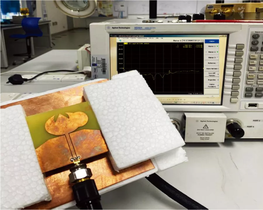 High-Gain Ultra-Wideband Half-Moon Monopole Patch Antenna with Metallic Reflector for GPR Systems