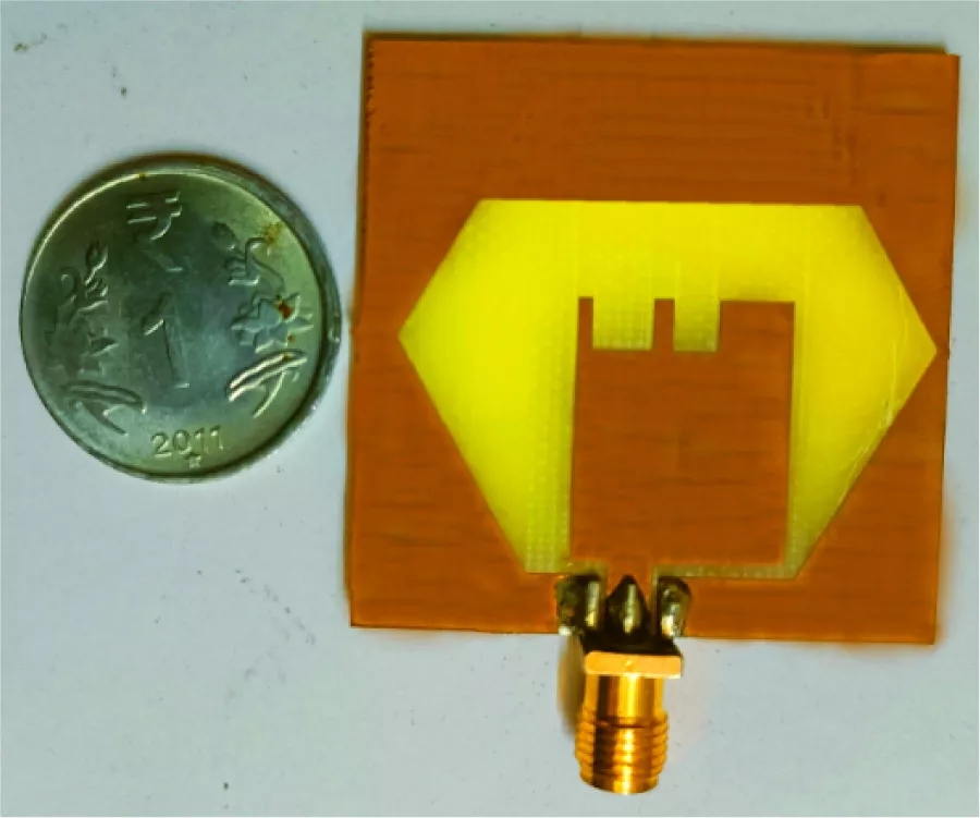 A Compact CPW-Fed Slotted Patch Antenna with Defective Ground for Wideband RF Energy Harvesting