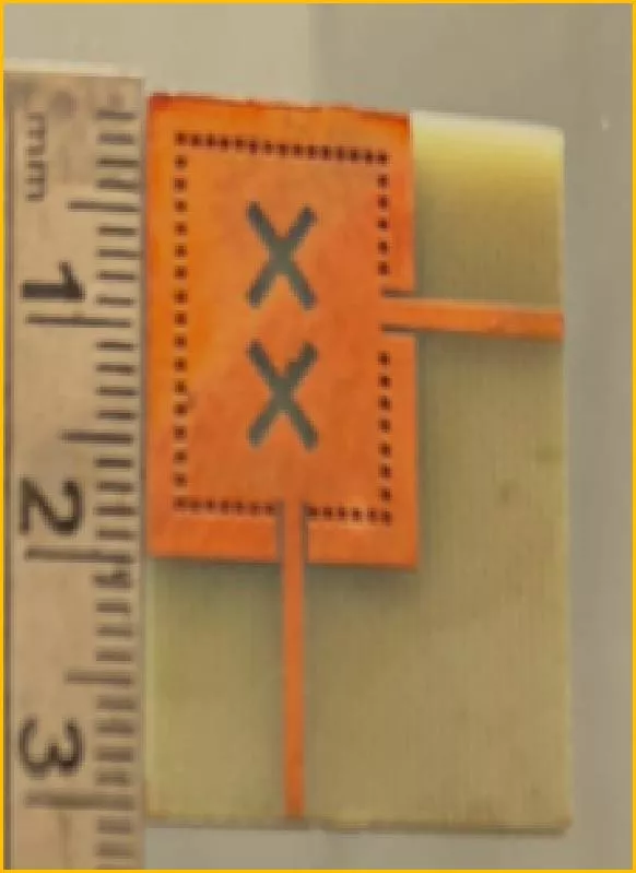 Multi-Band Cavity Backed SIW Based X-Shaped Slot Antenna for Ku and K Bands