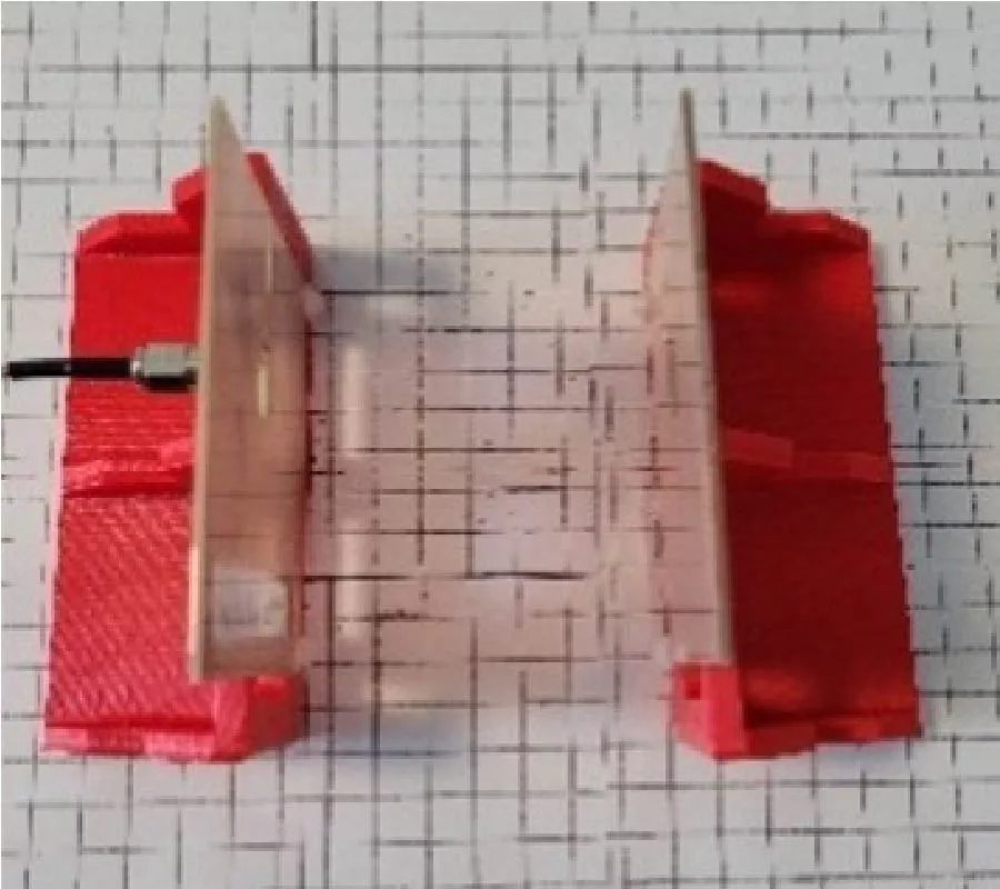 Improvement of High-Frequency Wireless Power Transfer with Capacitively Loaded Slot